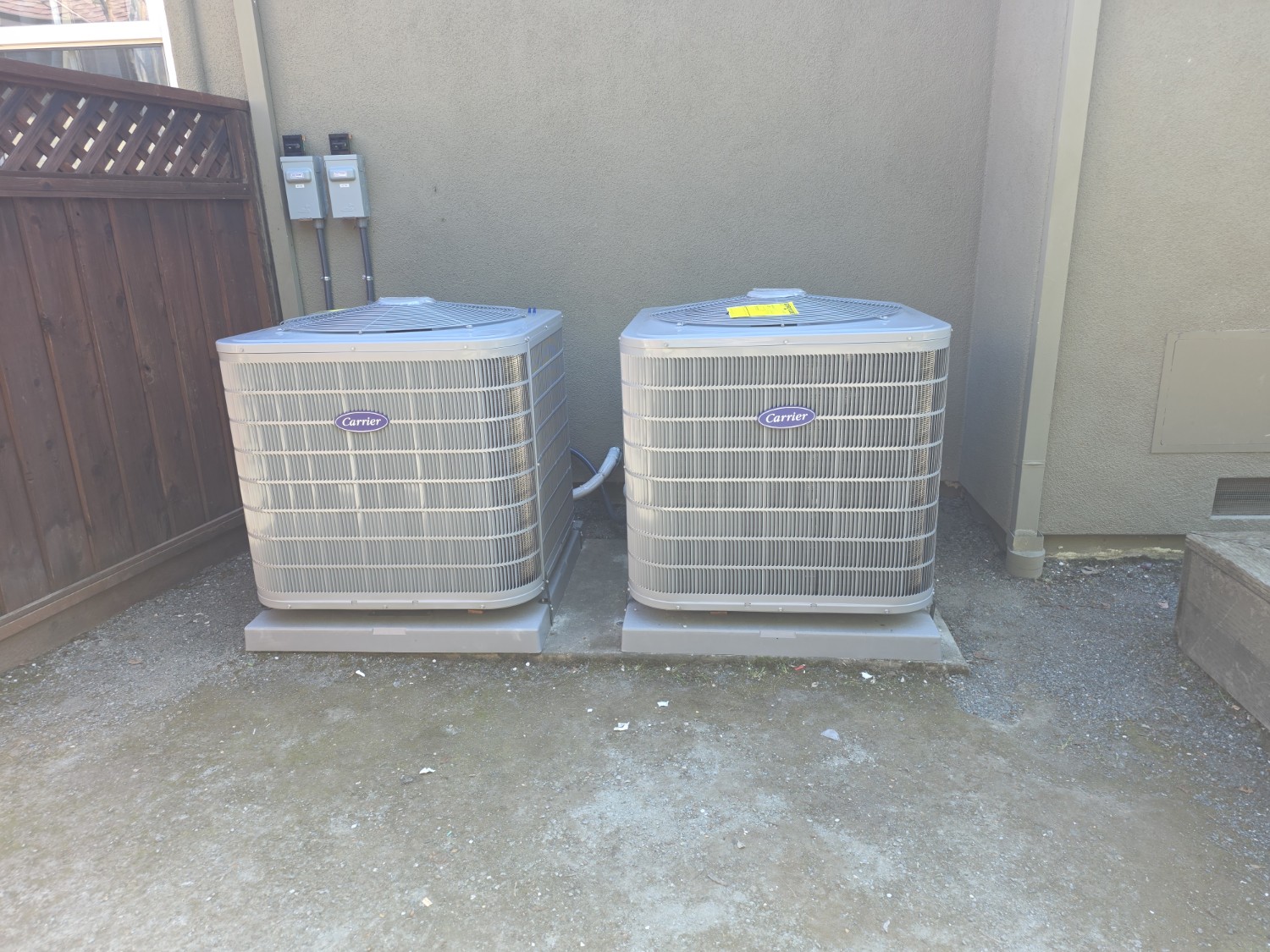 Two Carrier Infinity heat pump outdoor units installed in Danville